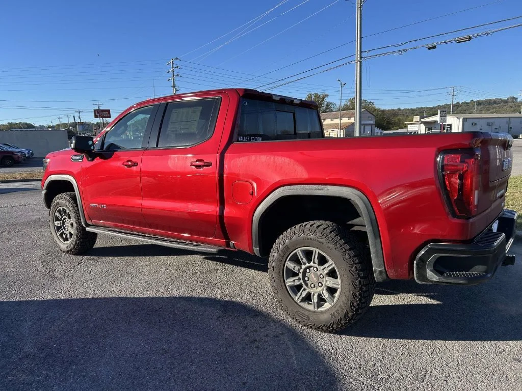 New 2026 VOLCANIC RED TINTCOAT GMC AT4X image 6