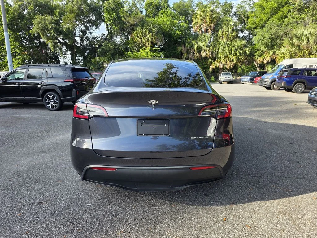 Used 2024 Tesla Model Y Long Range with VIN 7SAYGDEE5RA244803 for sale in Sanford, FL