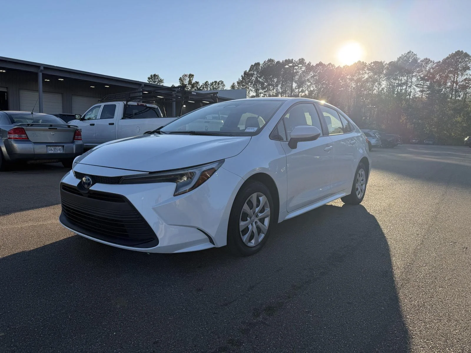 Used 2024 Wind Chill Pearl Toyota Hybrid LE image 1