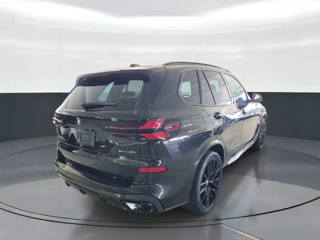 Used 2026 Black Sapphire Metallic BMW sDrive40i image 3