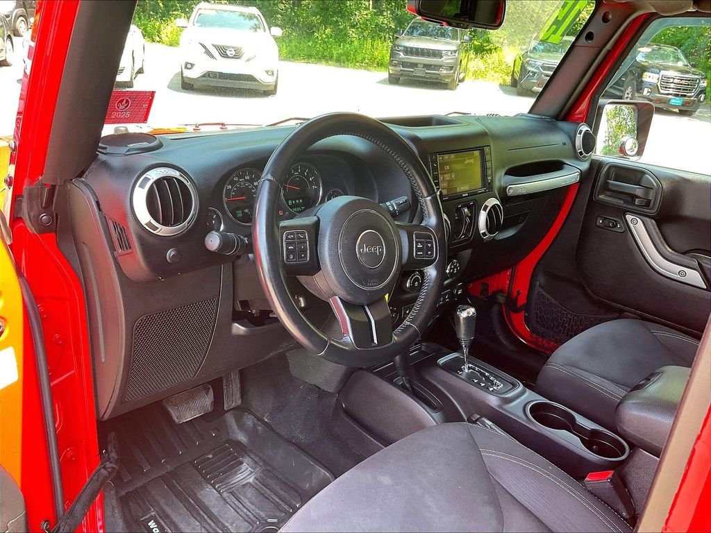 Used 2015 Red Jeep Unlimited Sahara image 8