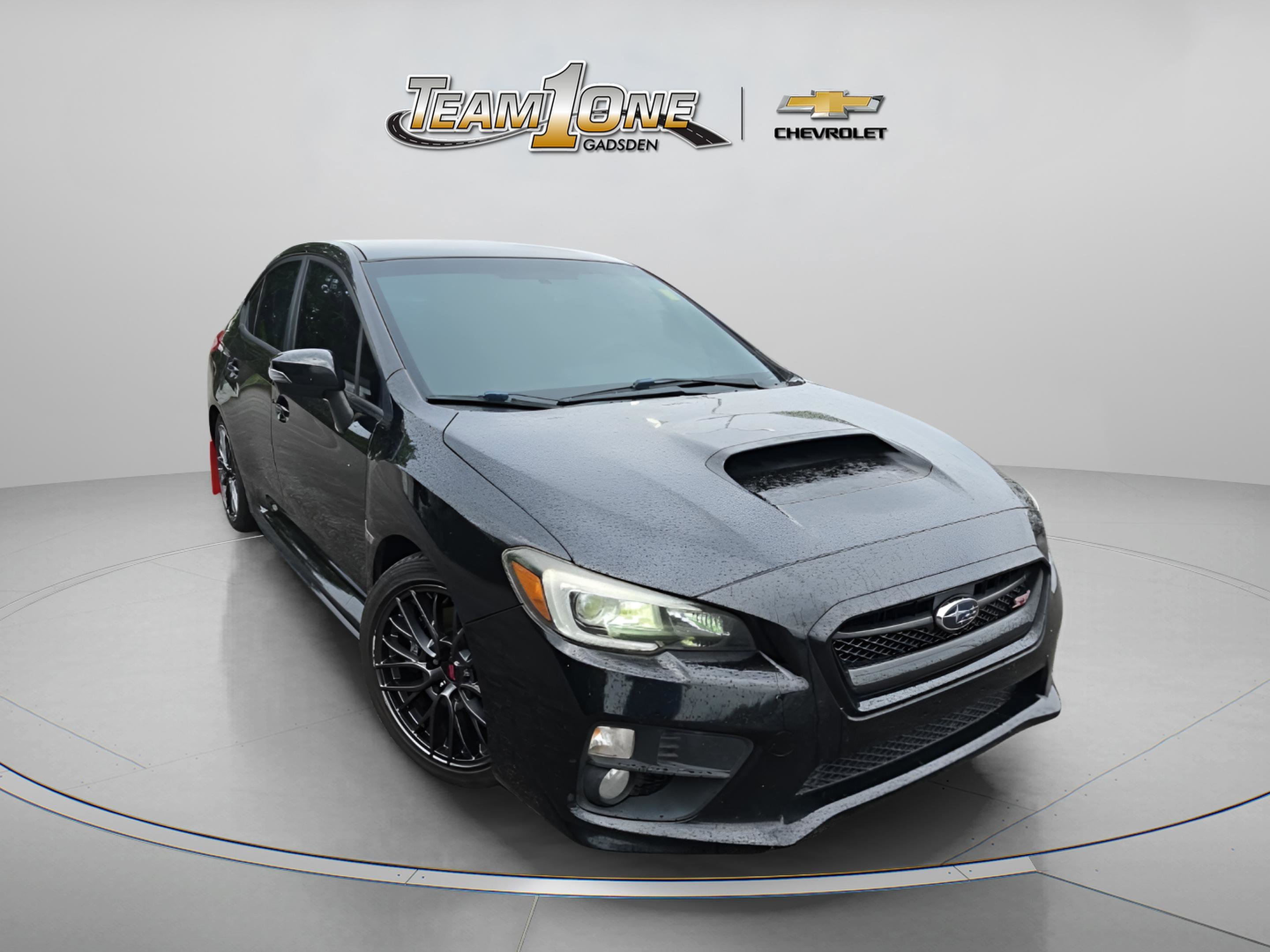 Used 2016 Crystal Black Silica Subaru STi image 1