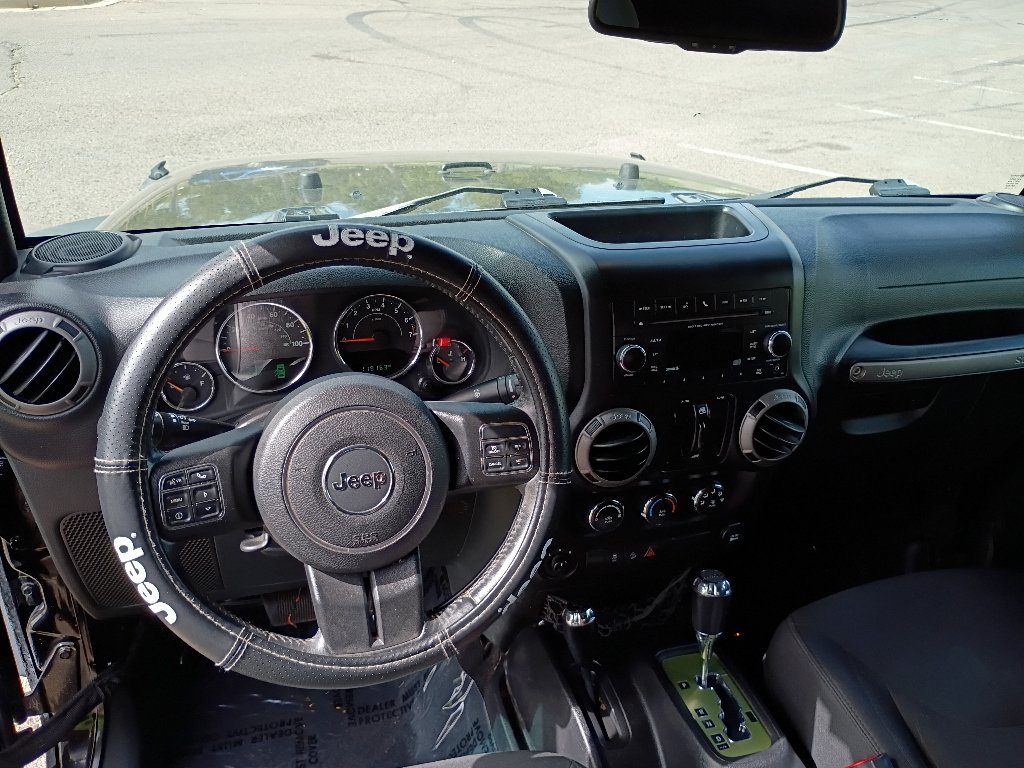 Used 2016 Black Clearcoat Jeep Sport image 23
