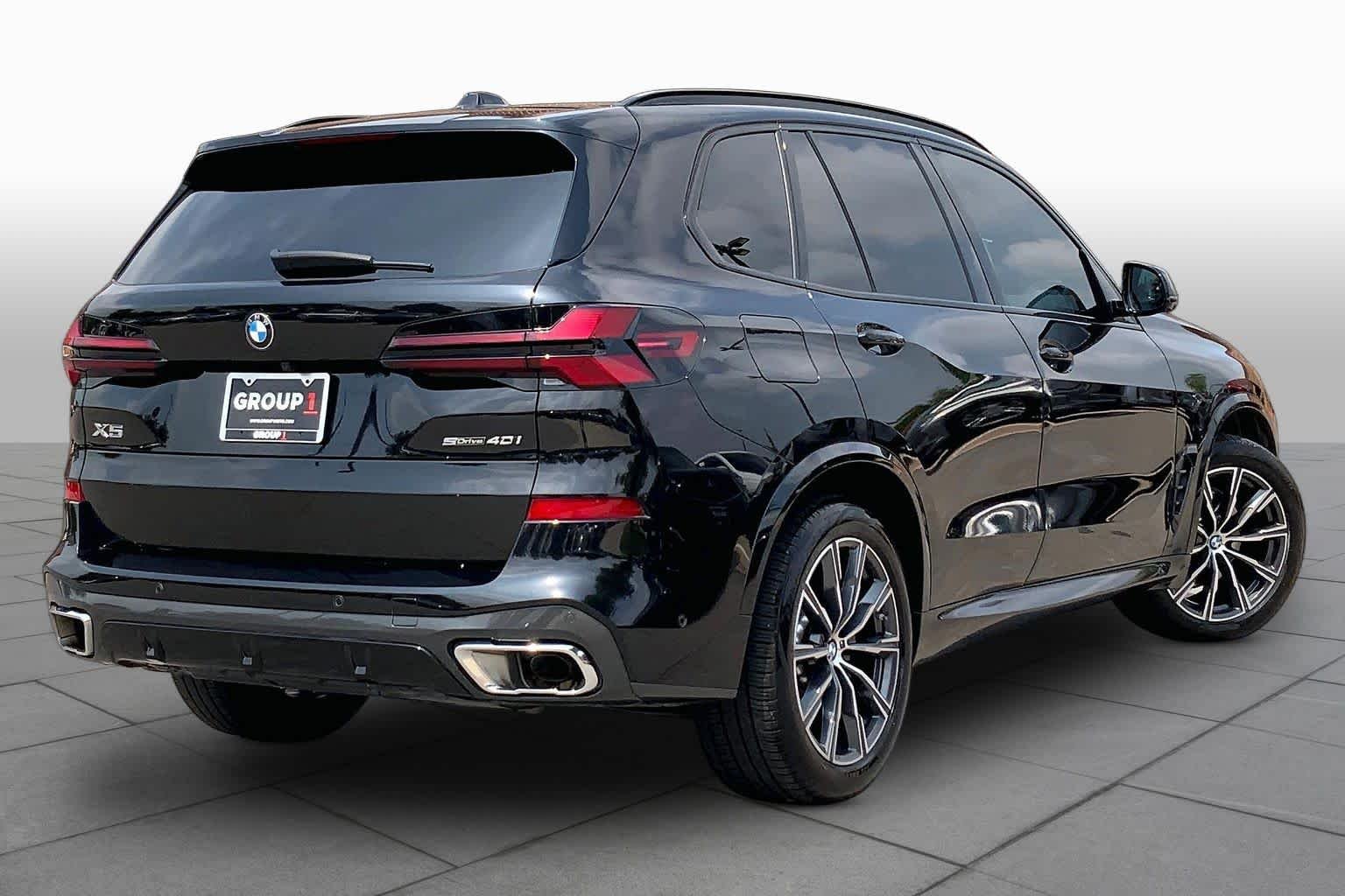 Used 2024 Black Sapphire Metallic BMW sDrive40i image 13