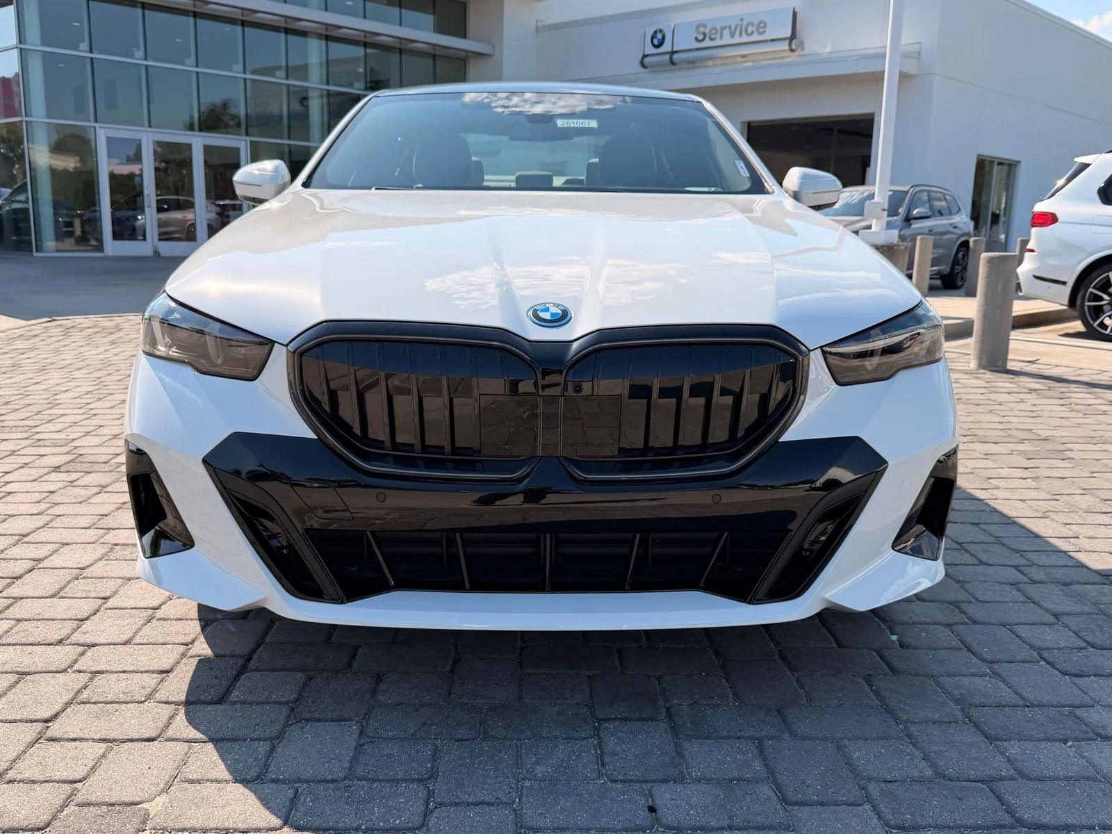 2026 BMW 5 Series 550e - Photo 6