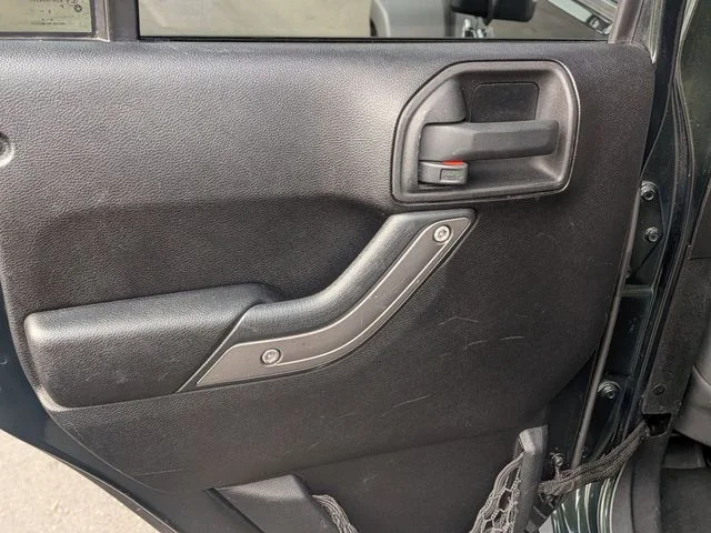 Used 2011 Green Jeep Unlimited Sport image 24