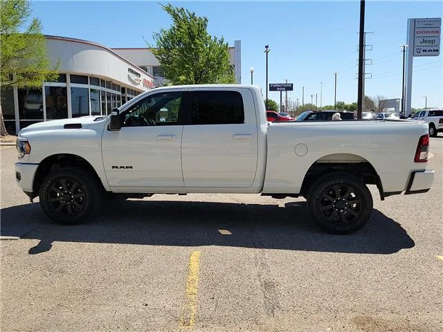 Used 2024 Bright White Clearcoat RAM Big Horn 4x4 Crew Cab 6.3 ft. box 149 in. WB image 2