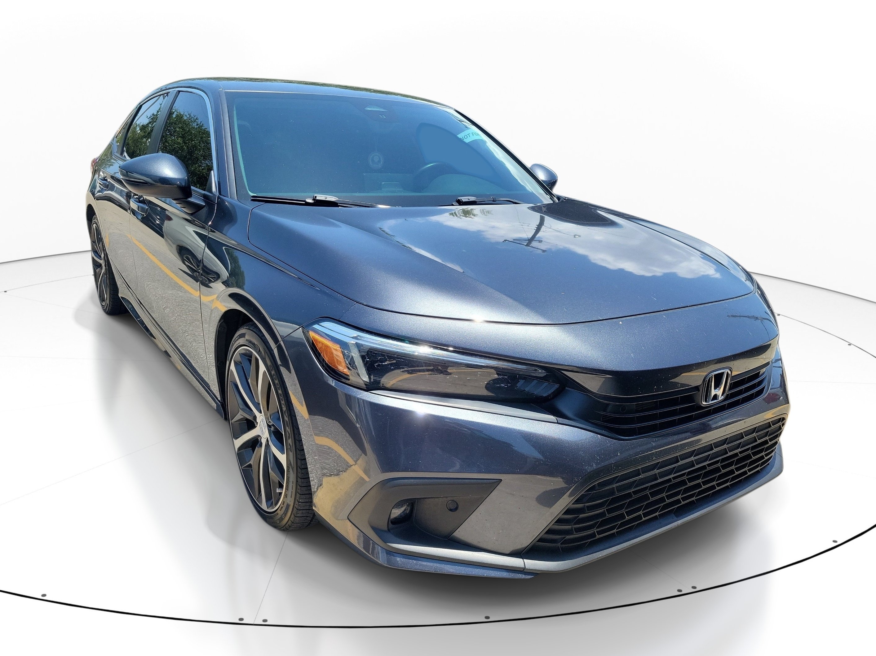 Used 2022 Sonic Gray Pearl Honda Touring image 1