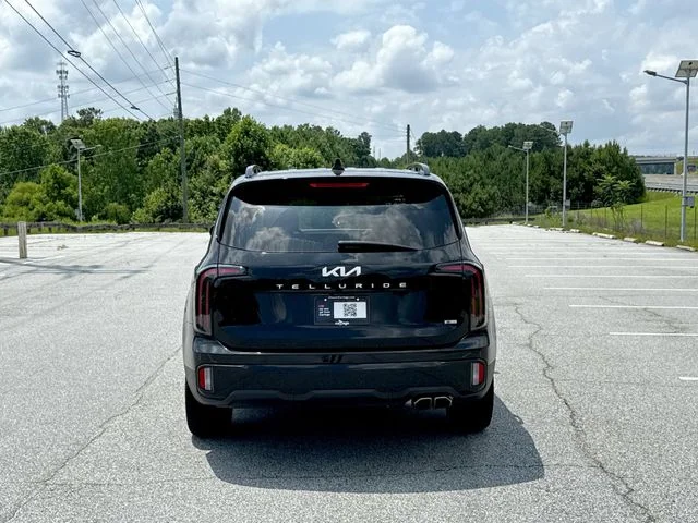 Used 2024 Black Kia EX X-Line image 4