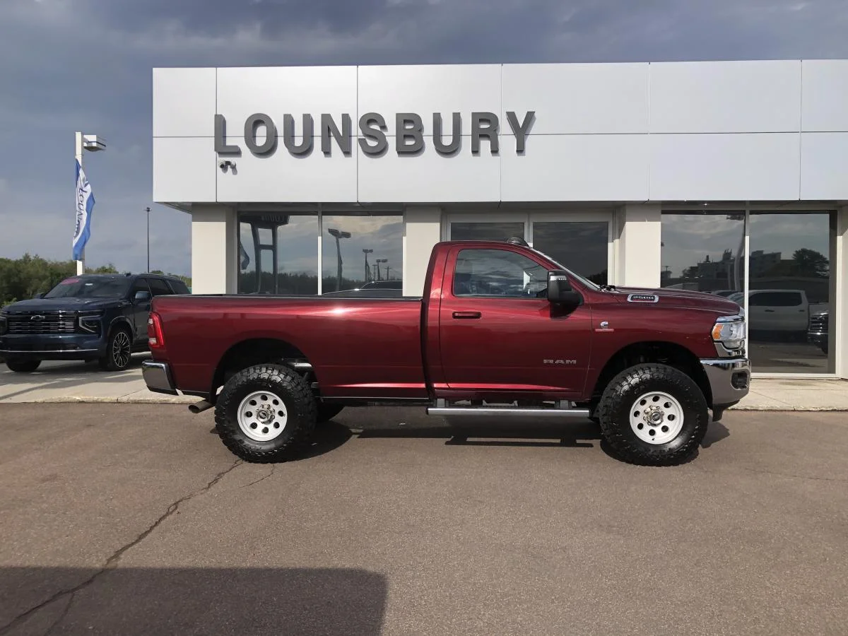 Used 2024 Silver RAM Big Horn 4x4 Reg Cab 8