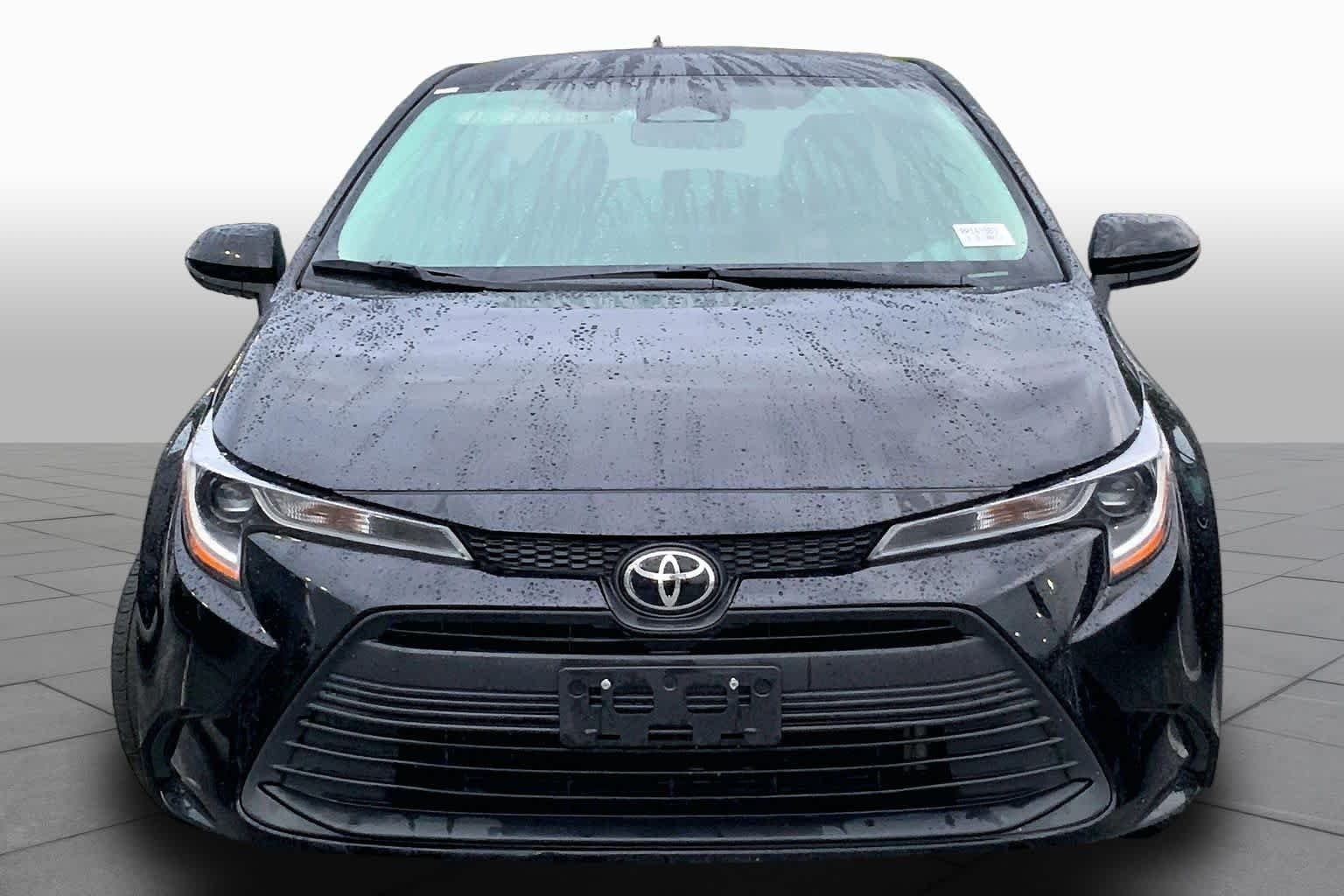 Used 2024 Midnight Black Metallic Toyota LE image 4
