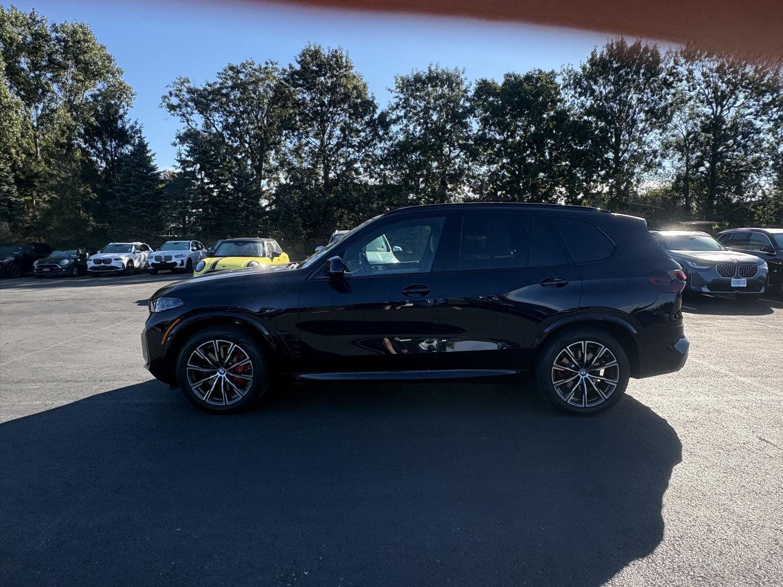 Used 2026 Carbon Black Metallic BMW xDrive40i image 4