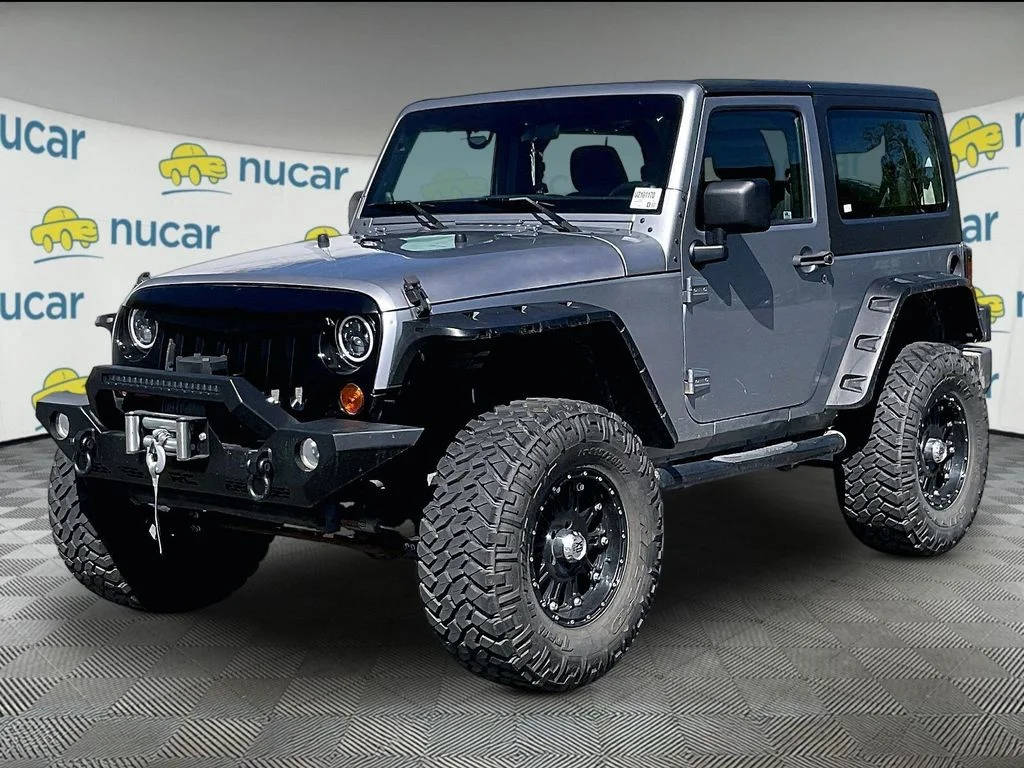 Used 2013 Billet Metallic Clearcoat Jeep Sport image 2