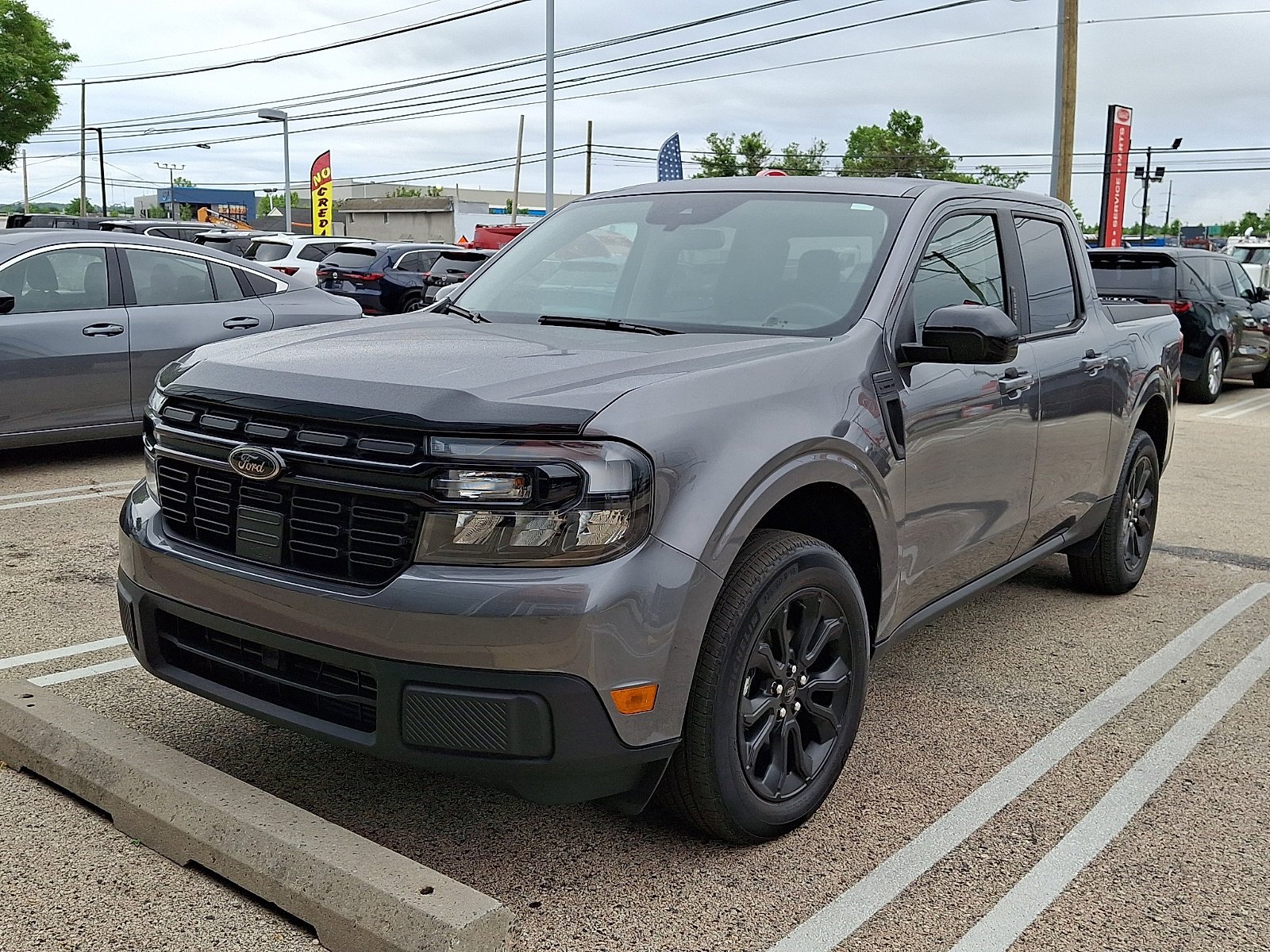 Used 2023 Carbonized Gray Metallic Ford LARIAT image 1