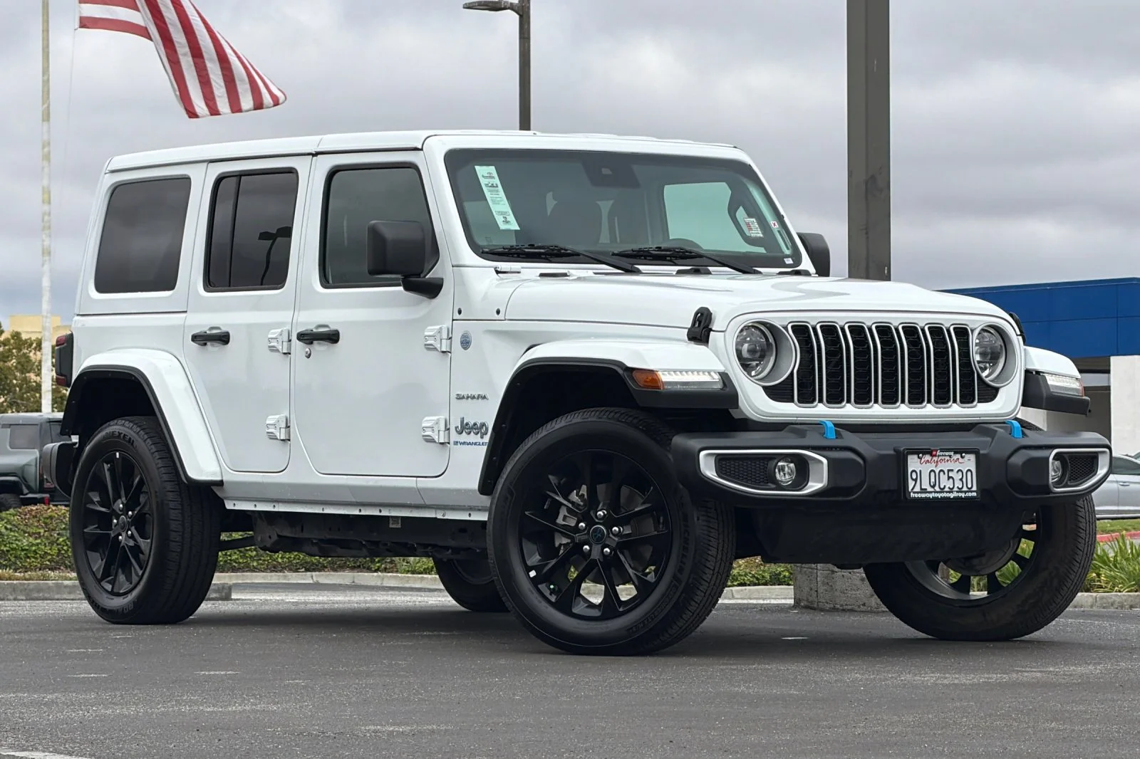 Used 2024 White Jeep Sahara 4xe image 2
