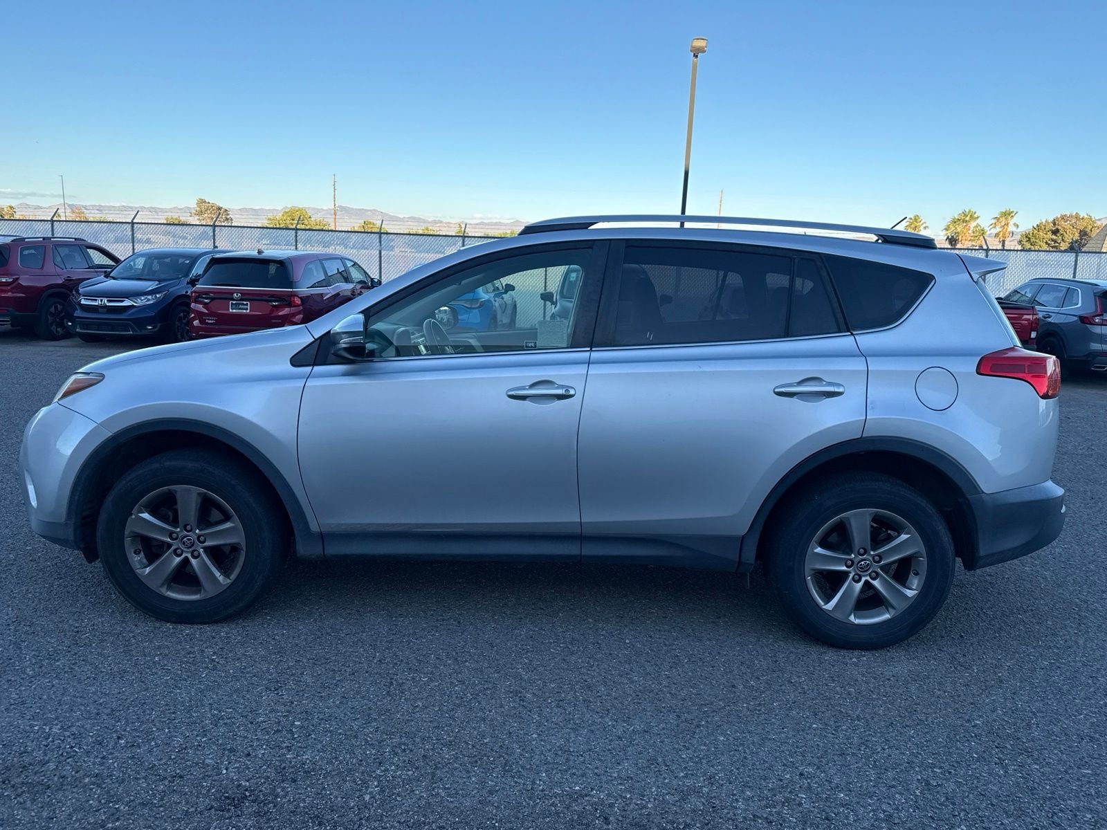 Used 2015 Toyota RAV4 XLE with VIN JTMWFREV4FJ043969 for sale in Kingman, AZ