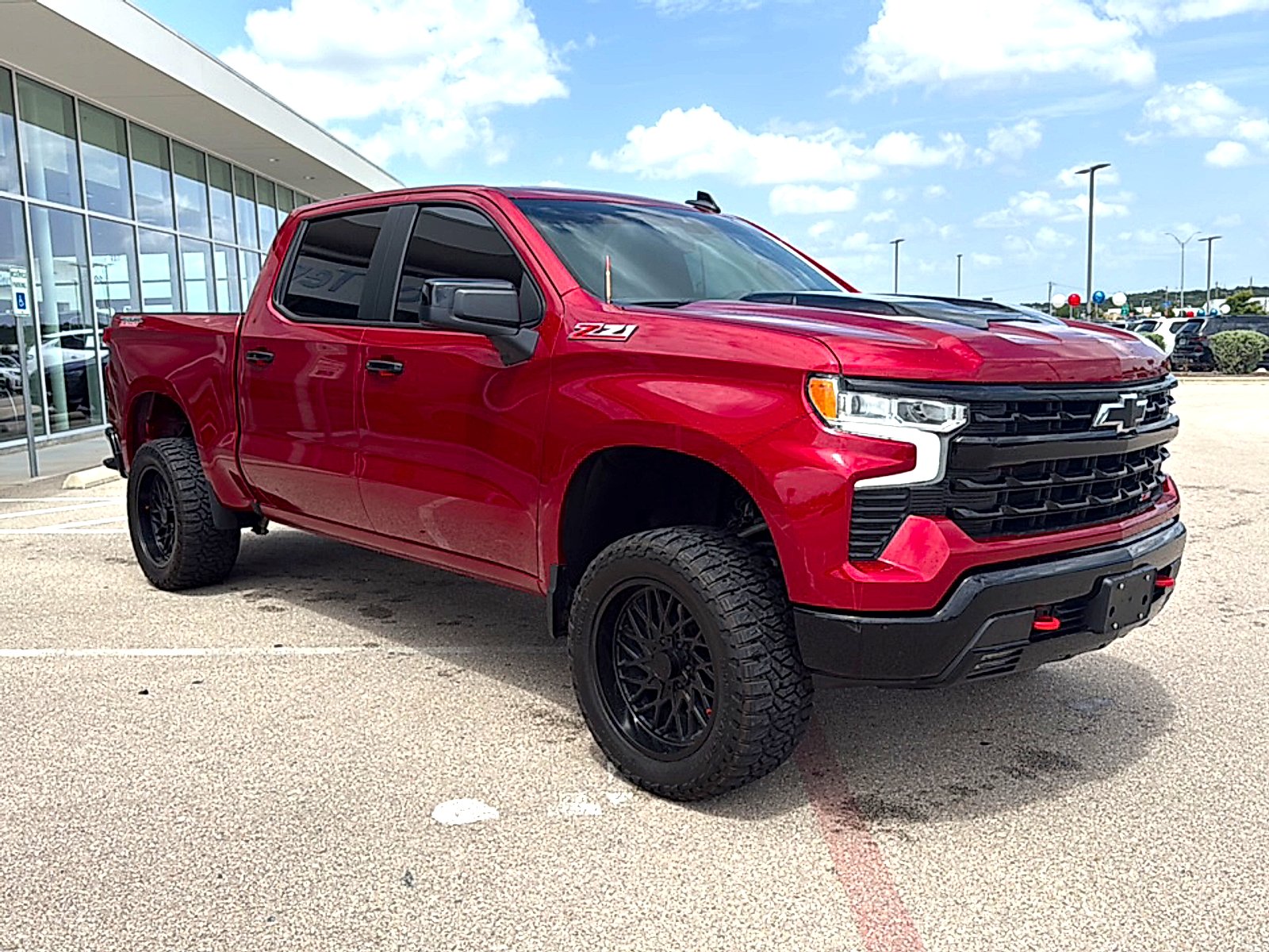 Used 2025 Radiant Red Tintcoat Chevrolet 4WD Crew Cab Short Bed LT Trail Boss image 3