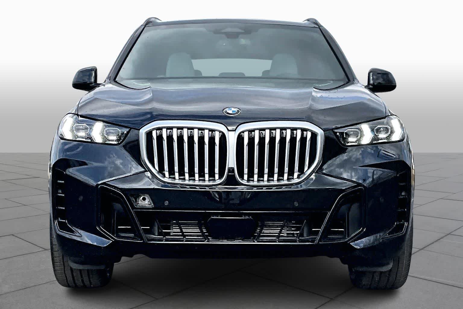 New 2026 Black Sapphire Metallic BMW sDrive40i image 3