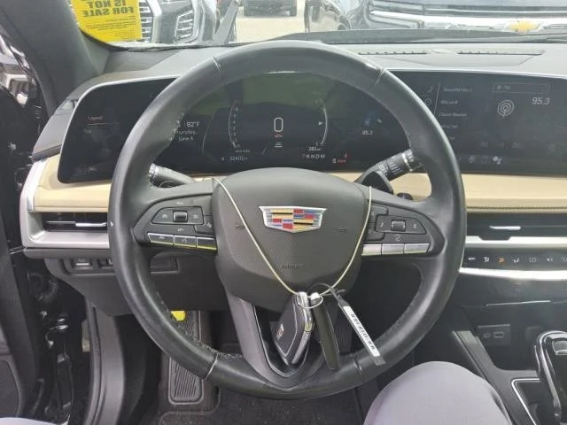 Used 2024 Stellar Black Metallic Cadillac Luxury image 9