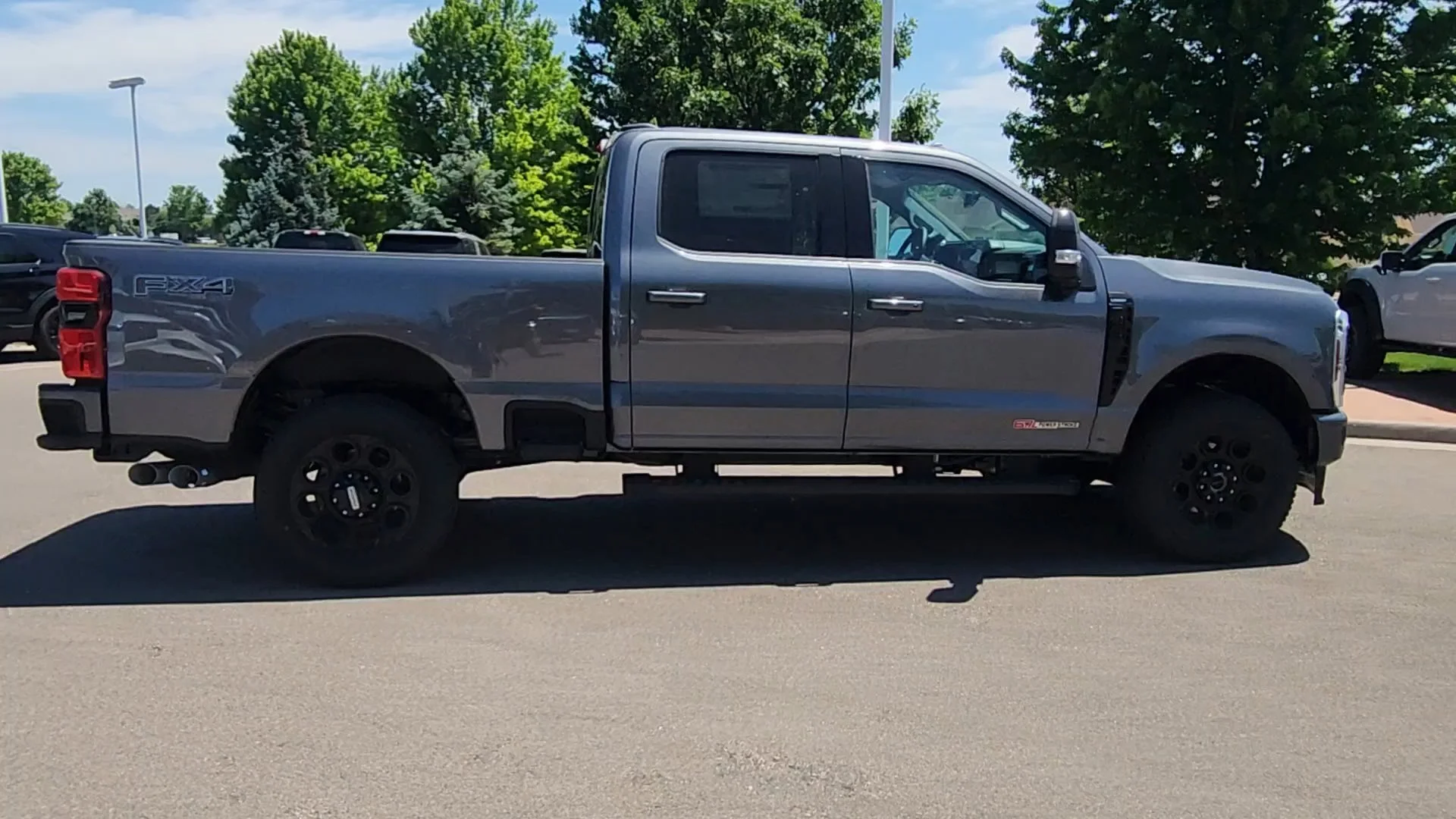 New 2026 Carbonized Gray Metallic Ford LARIAT image 6