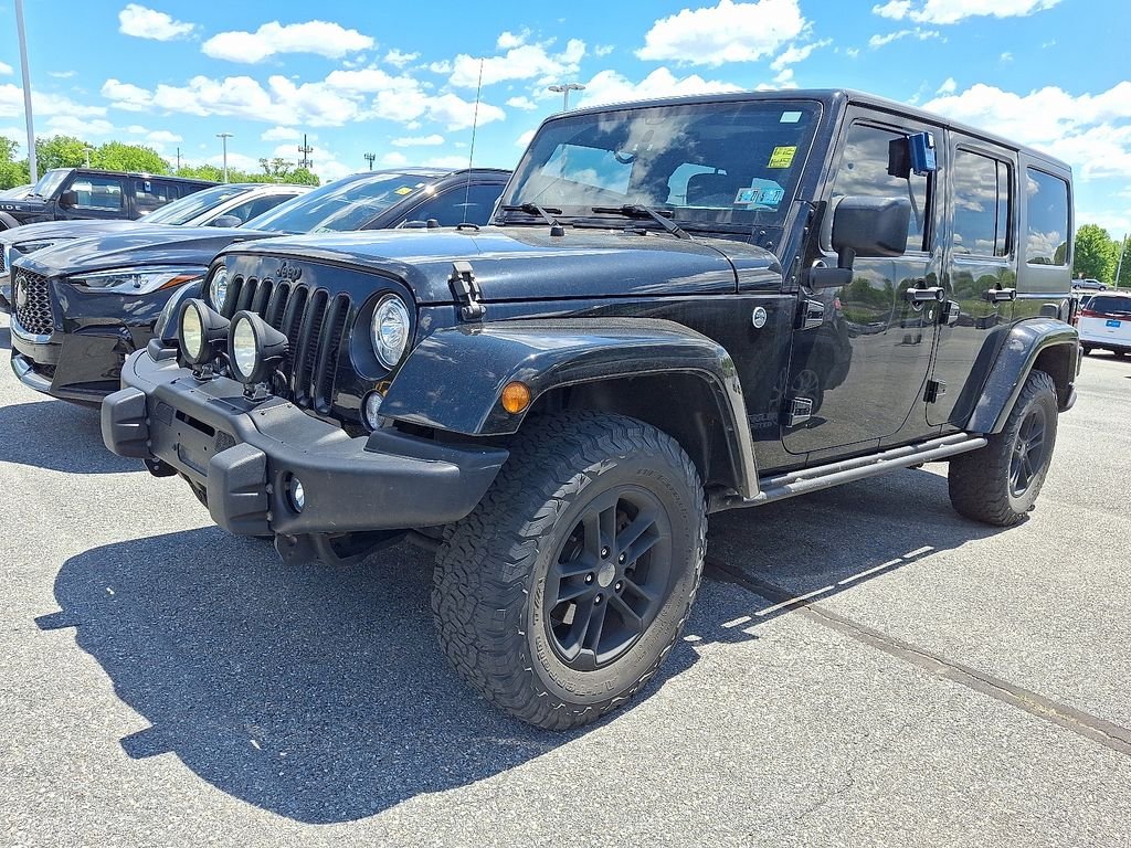 Used 2017 Black Jeep Unlimited Sahara image 3