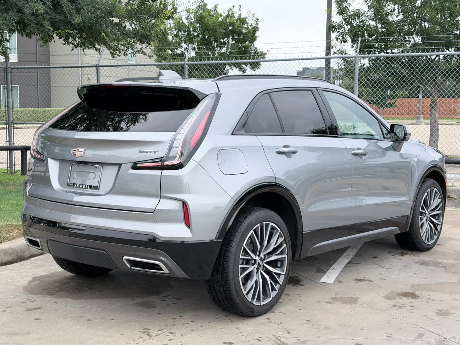 Used 2024 Argent Silver Metallic Cadillac Sport image 4