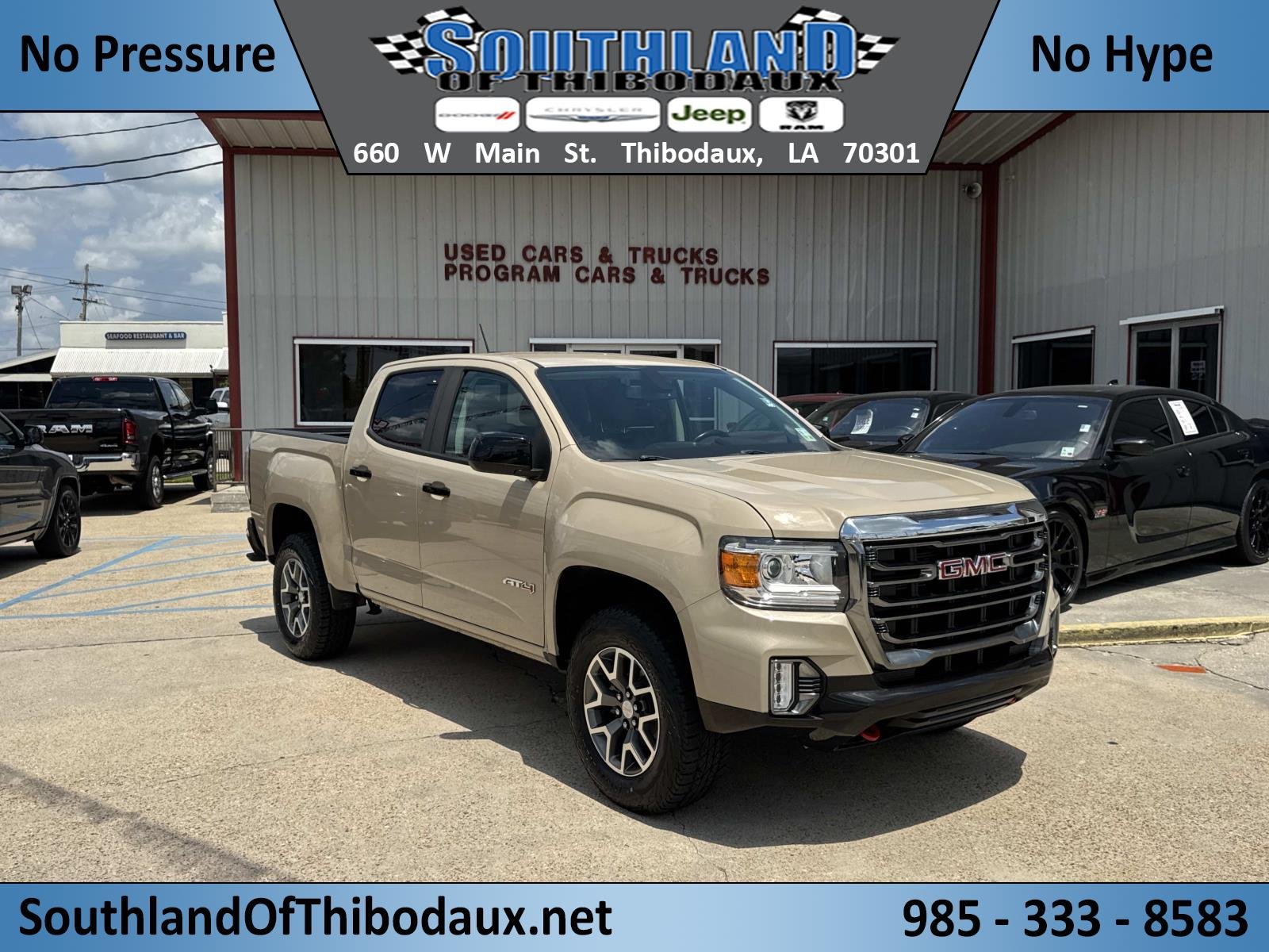 Used 2022 Desert Sand Metallic GMC 4WD AT4 w/Cloth image 1