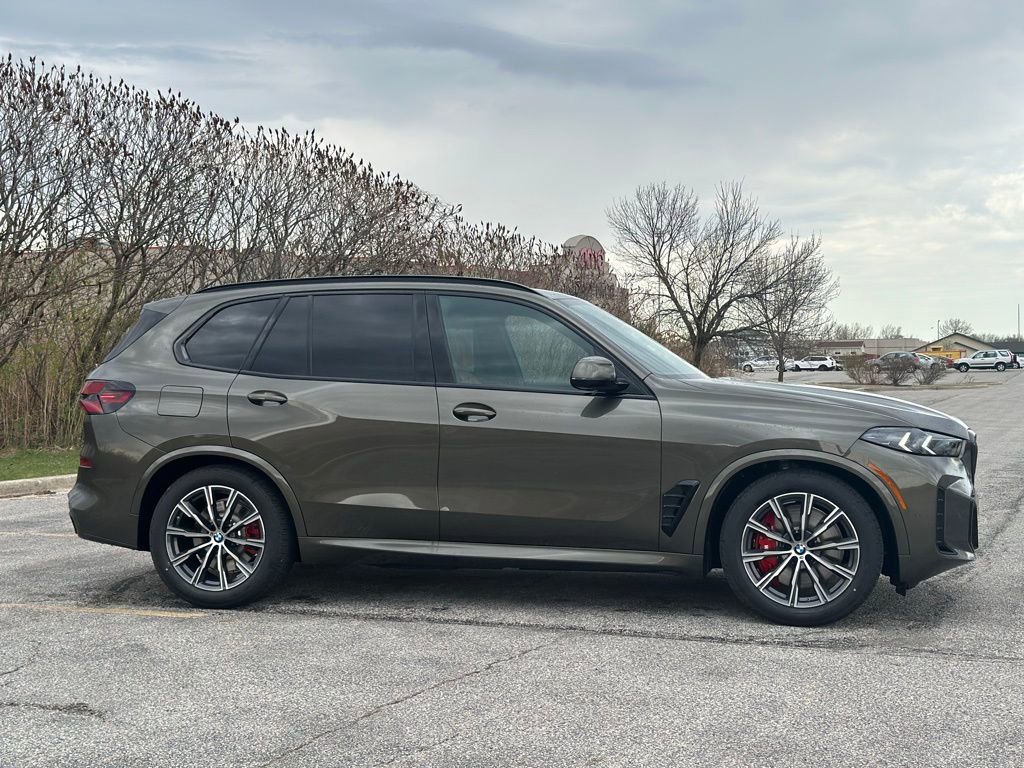 New 2026 Manhattan Green Metallic BMW xDrive50e image 8
