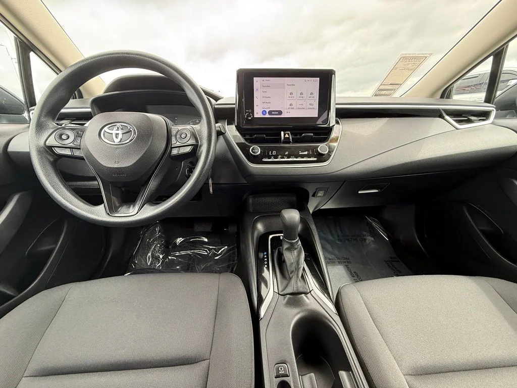 Used 2024 Black Toyota LE image 7