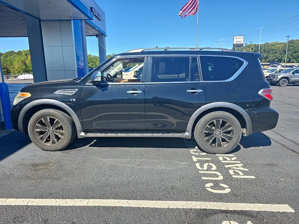 Used 2018 Super Black Nissan Platinum image 2
