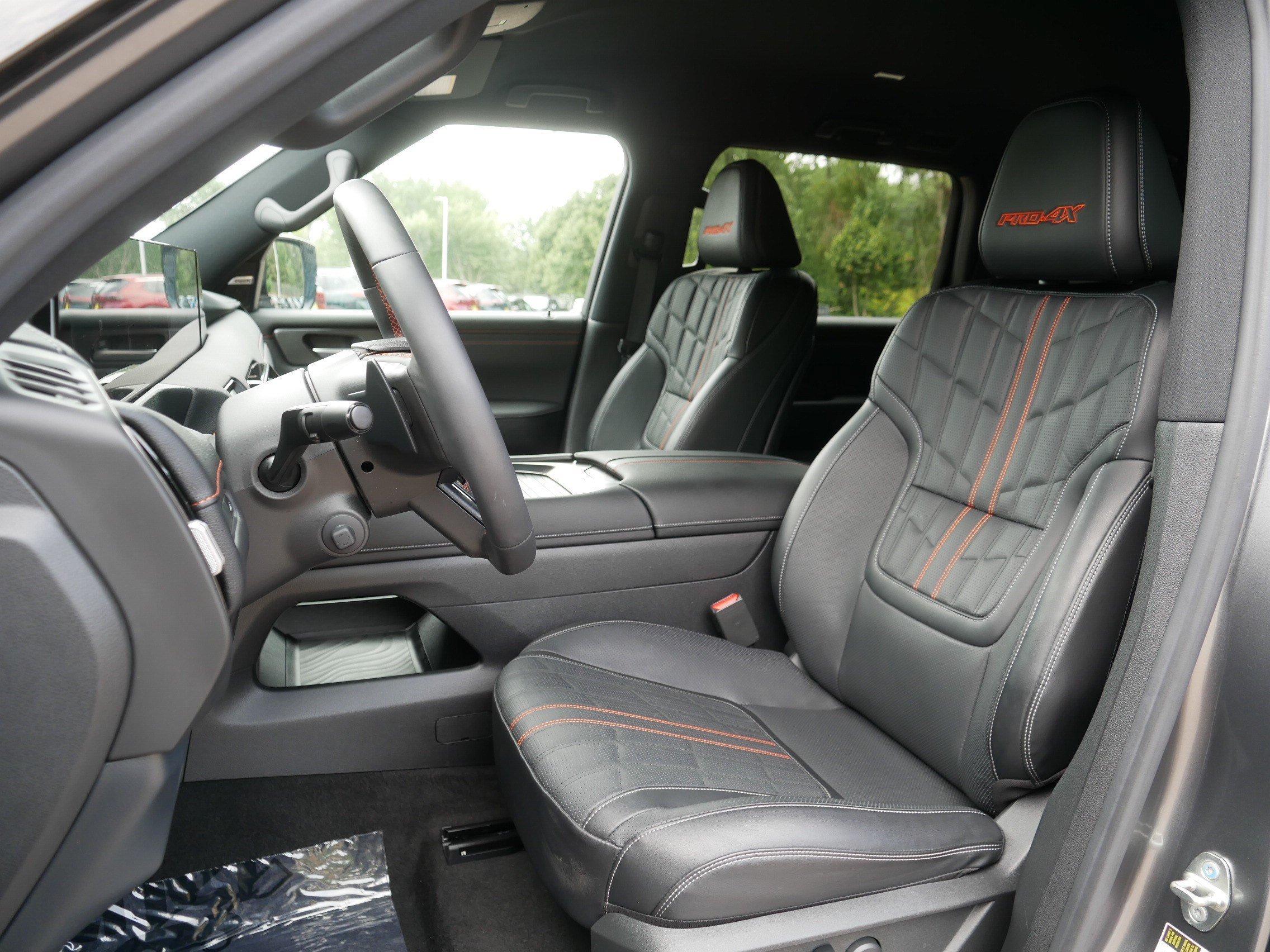 Used 2025 Gun Metallic/Super Black Nissan PRO-4X image 35