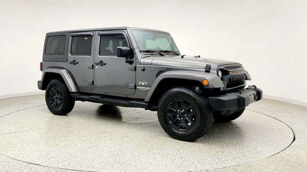 Used 2017 Granite Crystal Metallic Clearcoat Jeep Sahara 4x4 w/ Heated Seats, Remote Start & Connectivity Pkg image 3