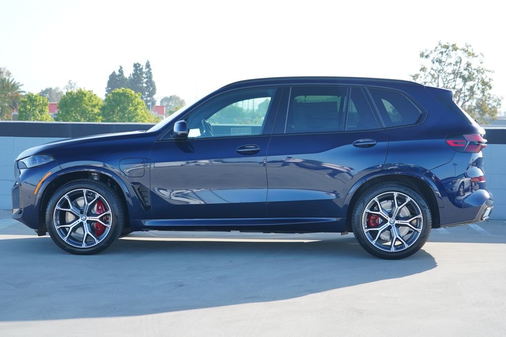 New 2026 Tanzanite Blue II Metallic BMW xDrive50e image 4