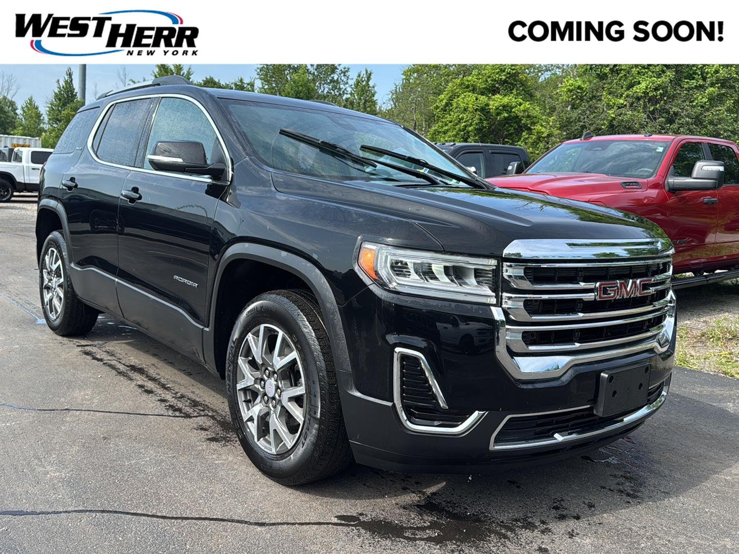 Used 2023 Ebony Twilight Metallic GMC SLE image 1
