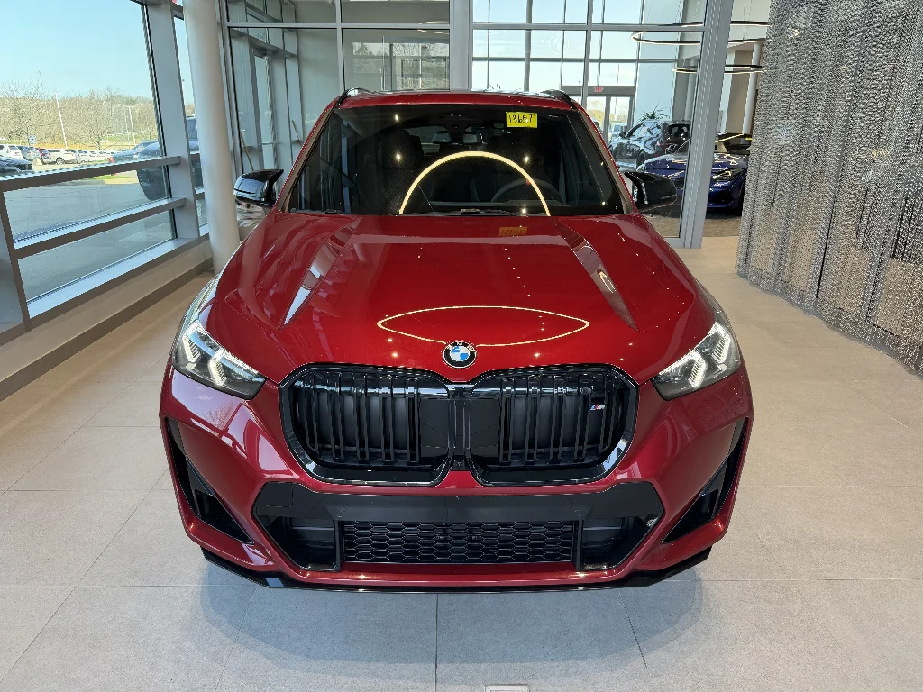 New 2026 Vegas Red Metallic BMW M35i image 2