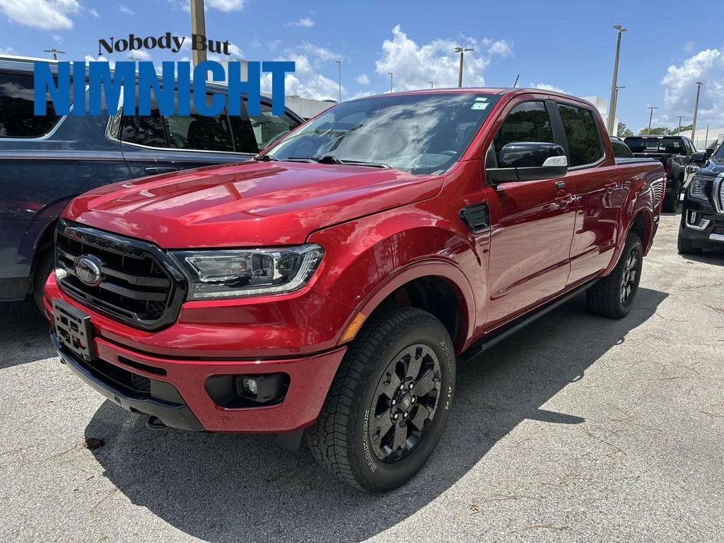 Used 2021 Rapid Red Metallic Tinted Clearcoat Ford LARIAT image 1
