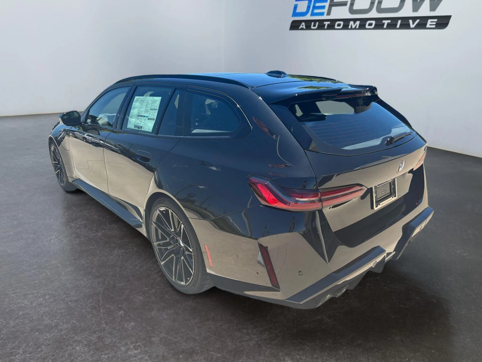New 2027 Black Sapphire Metallic BMW TOURING image 17