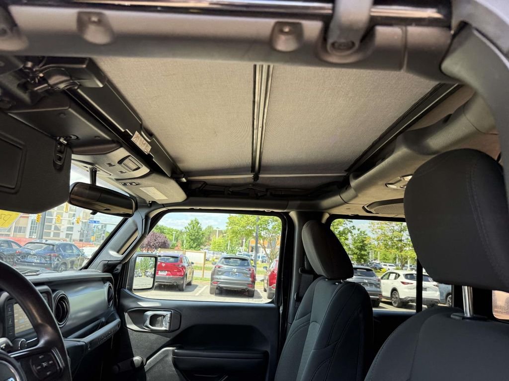 Used 2020 Black Jeep Unlimited Sport image 4