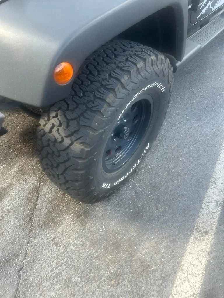Used 2012 Black Jeep Sport image 2