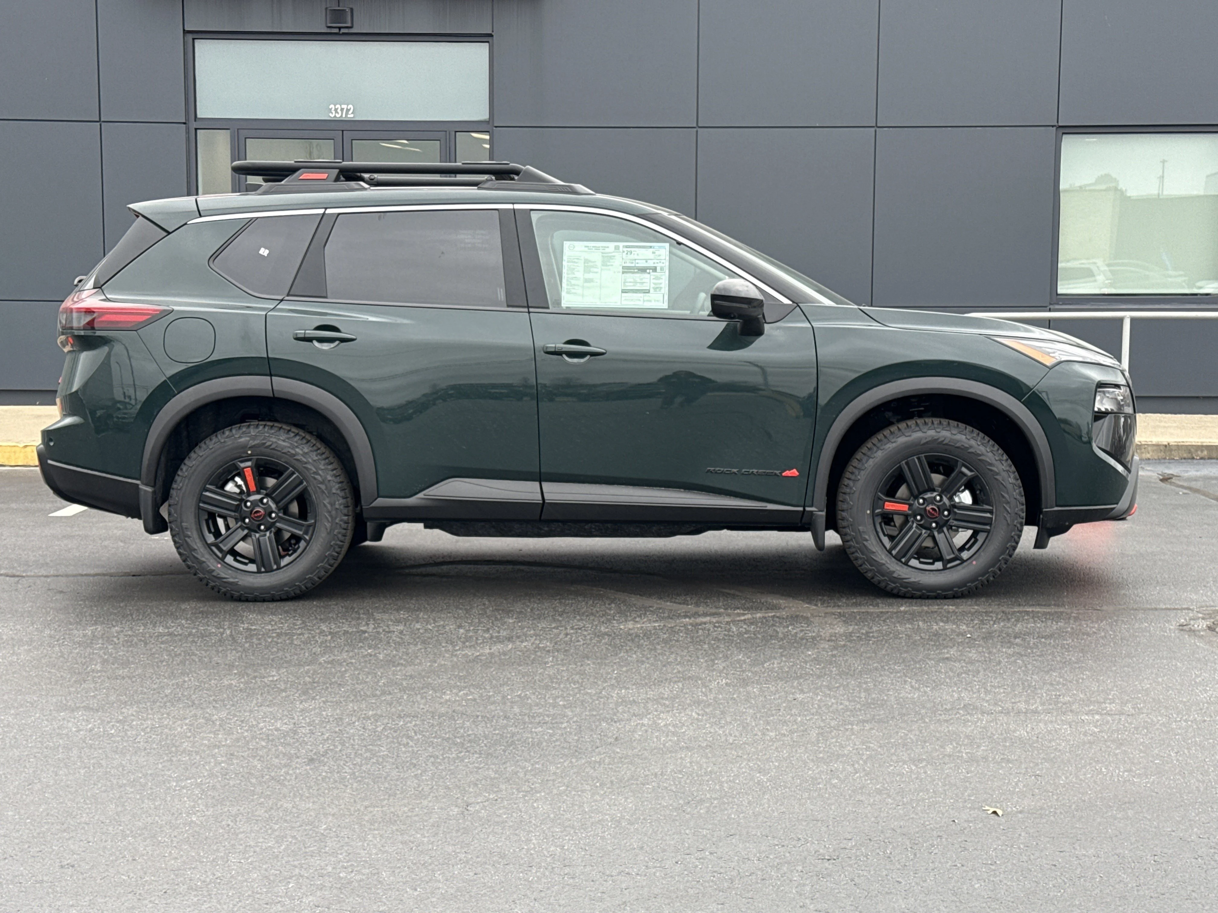 New 2026 Obsidian Green Nissan Rock Creek AWD image 2