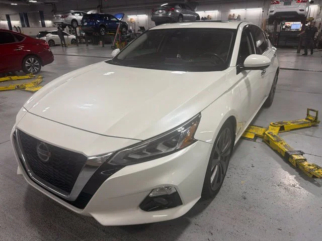 Used 2019 Pearl White Nissan 2.0 Edition ONE image 1