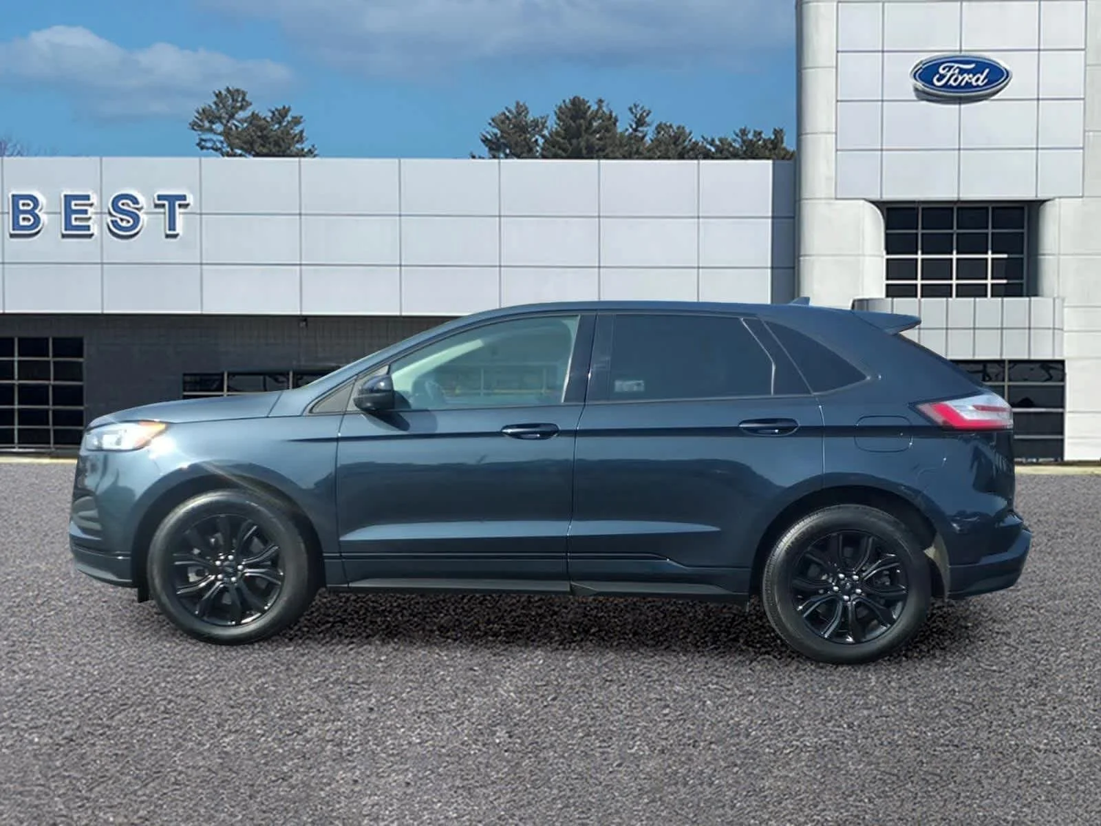 Used 2024 Stone Blue Ford SE image 2