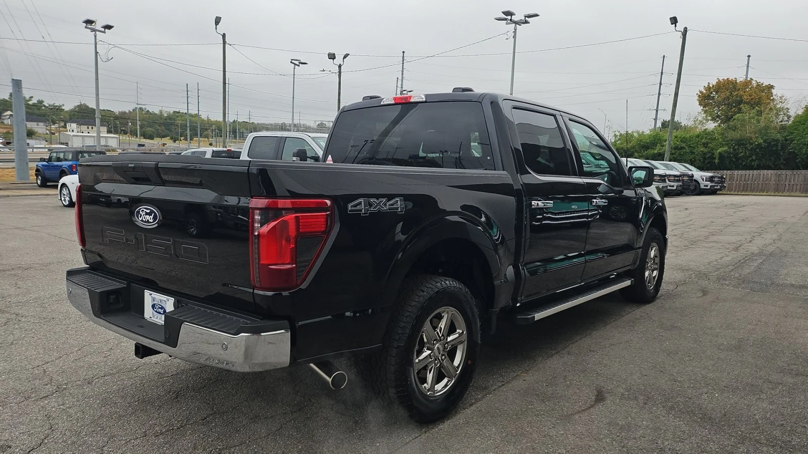 Used 2025 Agate Black Metallic Ford XLT 4WD image 5