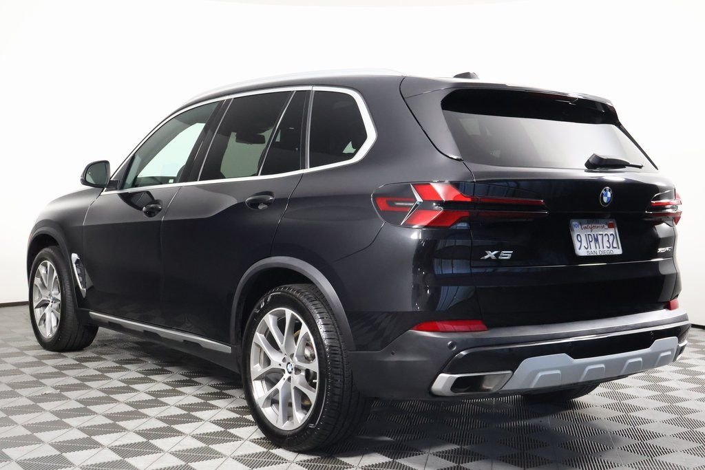 Certified Used 2024 Black Sapphire Metallic BMW sDrive40i image 6