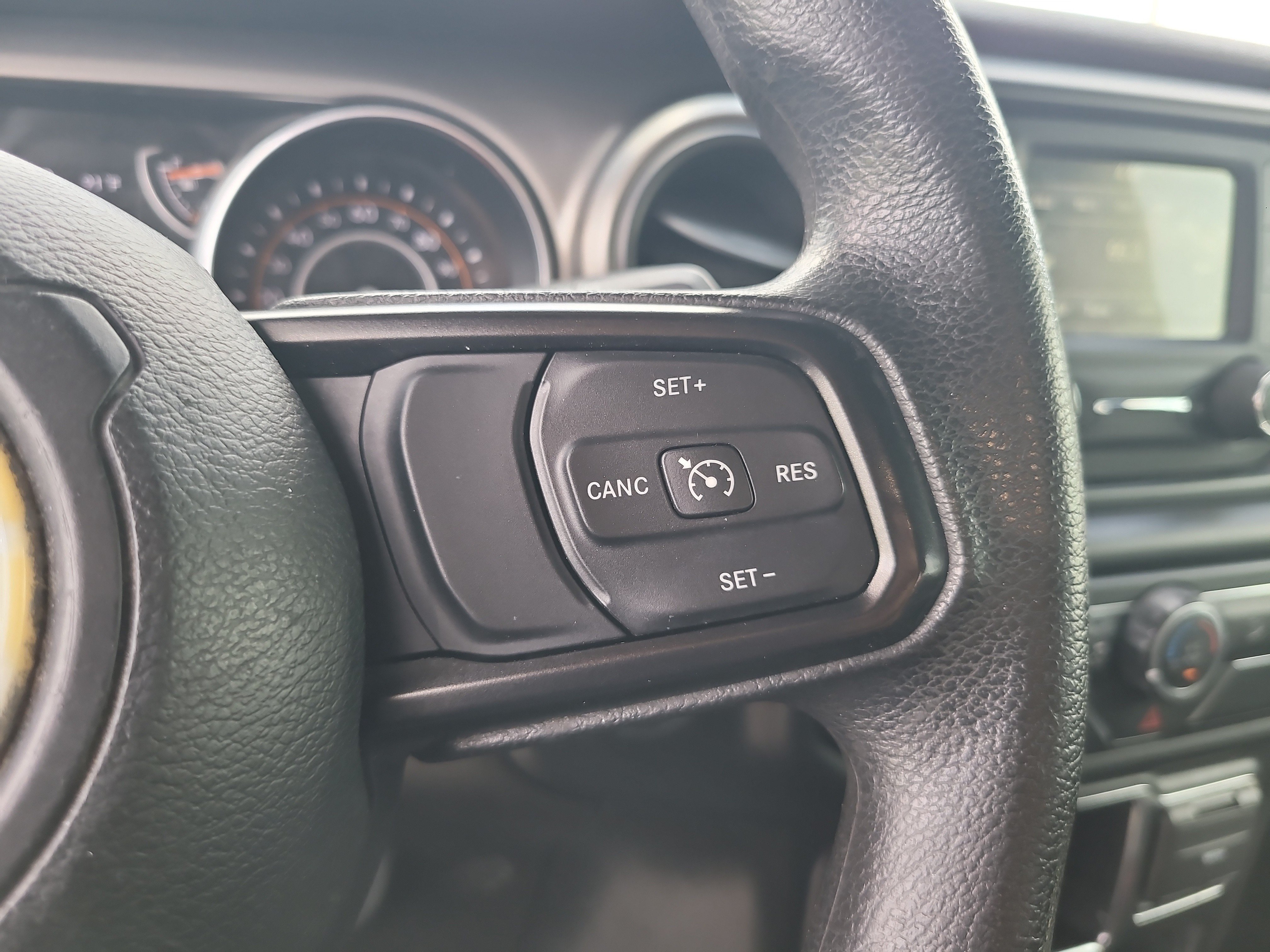 Used 2019 Granite Crystal Metallic Clearcoat Jeep Sport image 28