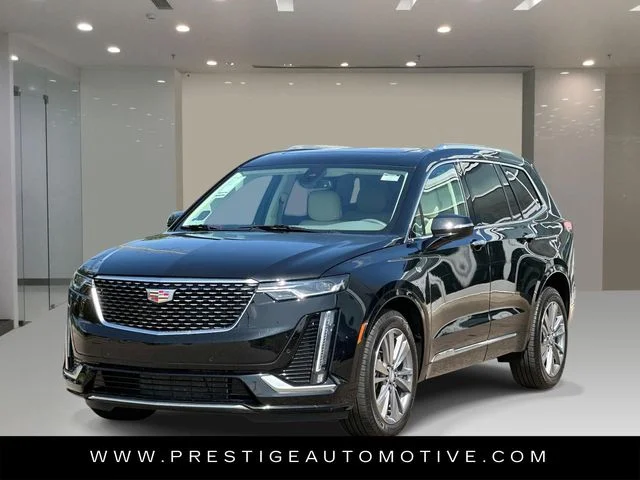Used 2024 Black Cadillac Premium Luxury image 1