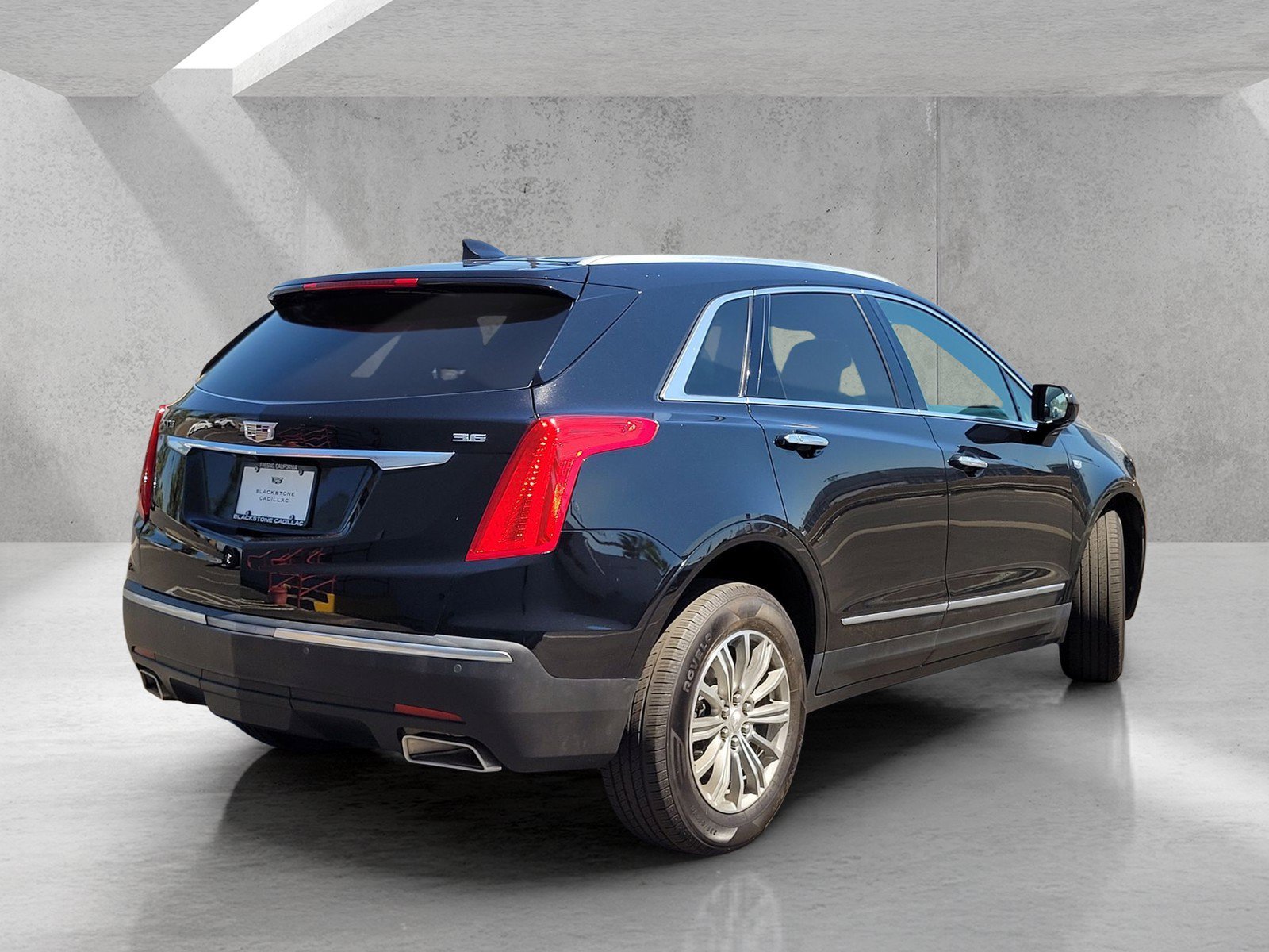 Used 2017 STELLAR BLACK METALLIC Cadillac Luxury FWD image 4