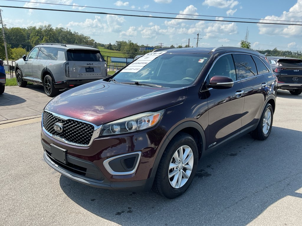 Used 2016 Dark Cherry Kia LX image 4