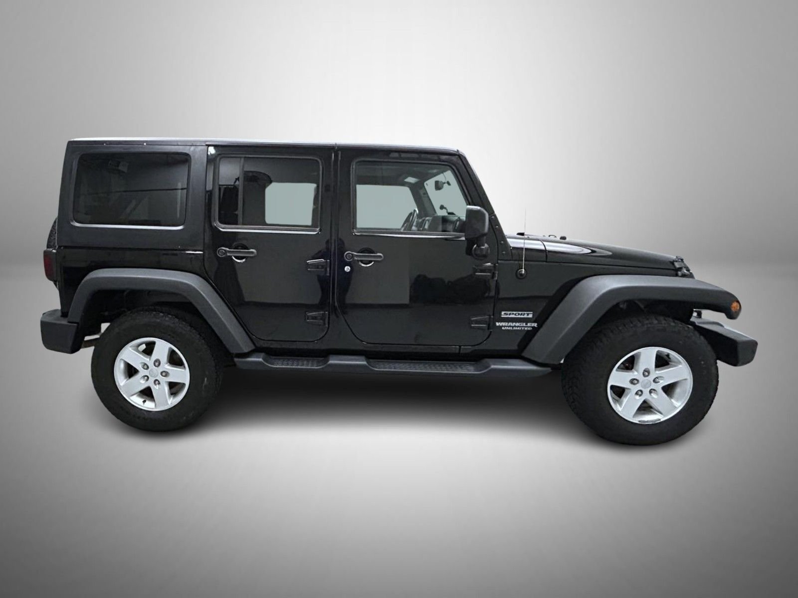 Used 2014 Black Jeep Unlimited Sport image 4