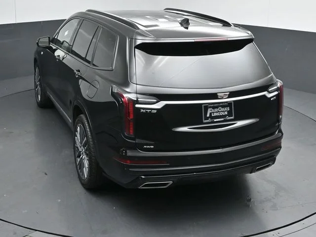 Certified Used 2025 Stellar Black Metallic Cadillac Sport image 50